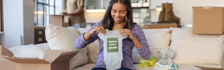A military family packs for a PPM after receiving PCS orders.