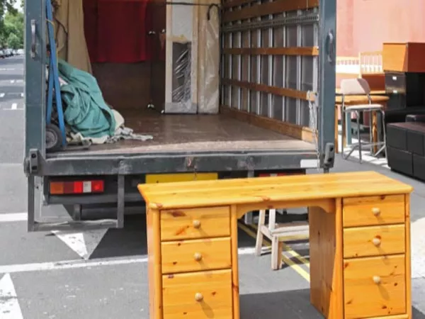 Rental truck getting loaded for a cheap move.