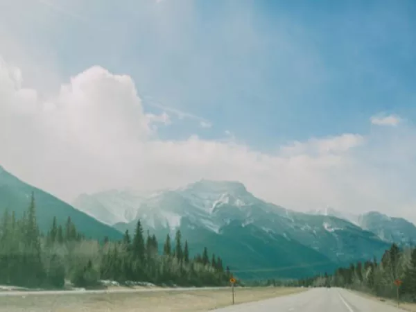 Image showing the scenic view of the mountains as you drive a rental truck into Canada.