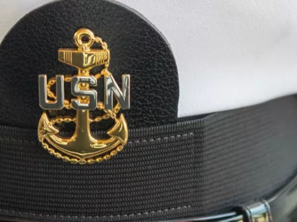 U.S. Navy hat, waiting to be packed for a move.