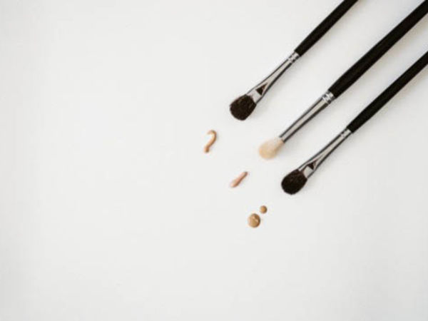 Makeup brushes with makeup dots, showing to pack clean brushes when packing makeup for a move.