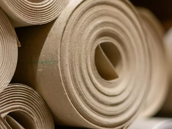 Rolls of packing paper waiting to be used for a move.