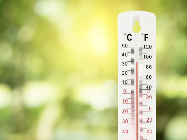 A thermometer showing warm temperatures during a summer move.