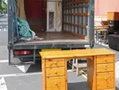 Rental truck getting loaded for a cheap move