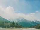 Image showing the scenic view of the mountains as you drive a rental truck into Canada.