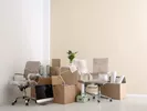 Office items packed and ready for moving as part of a job relocation.