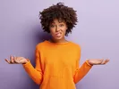Woman shrugging her shoulders wondering how to move without a forwarding address.