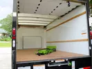 Inside of an empty moving truck.