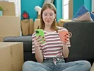 Woman accessing the U-Pack dashboard on her cell phone to manage her move.