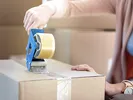 tape gun on box